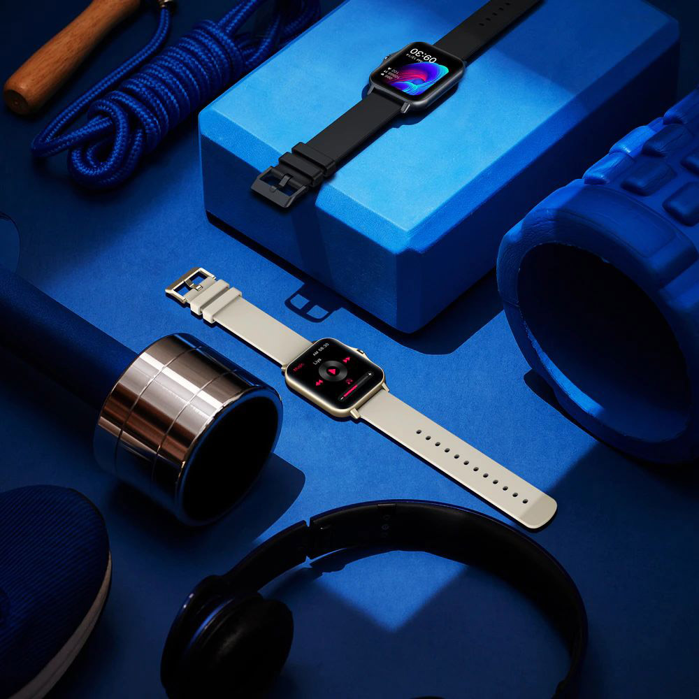 Zeblaze GTS 2 Gold and Black smartwatches on blue background