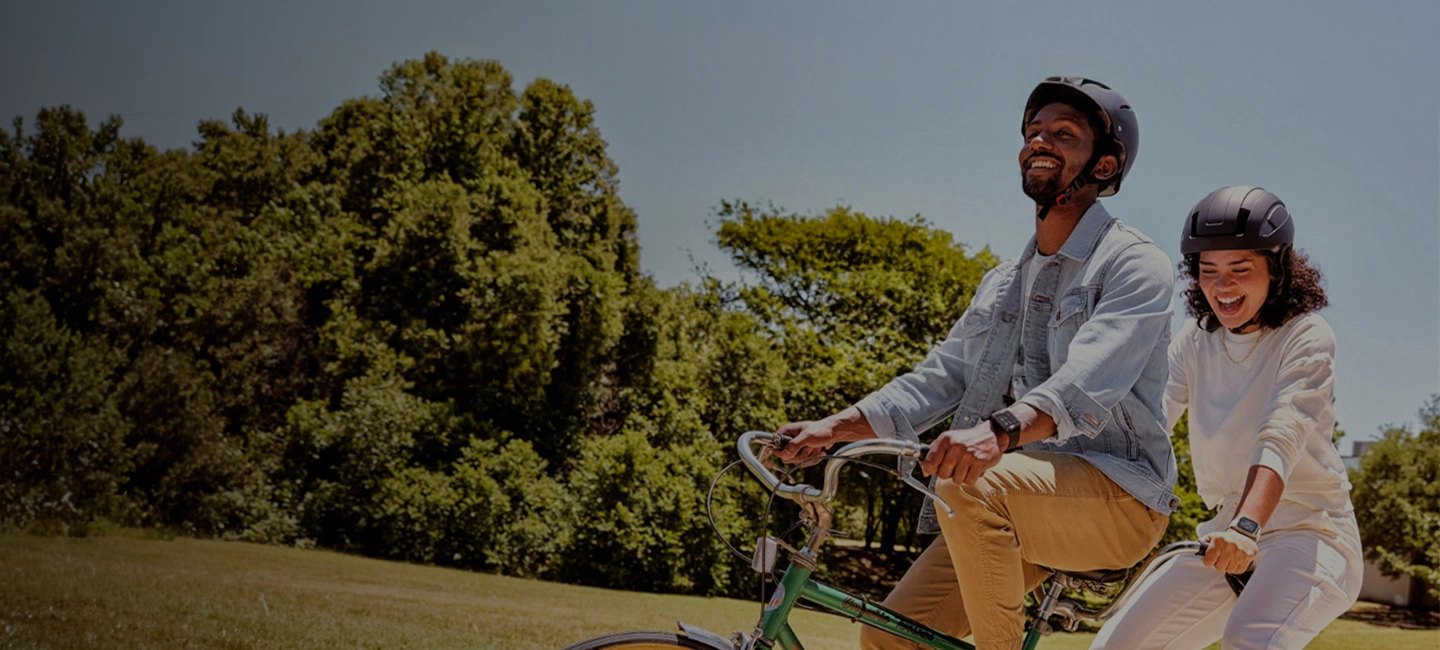 Man and woman riding bicycles